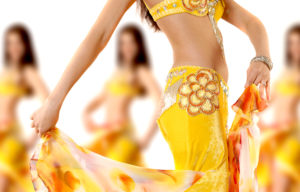 The girls dancing belly dance on a white background